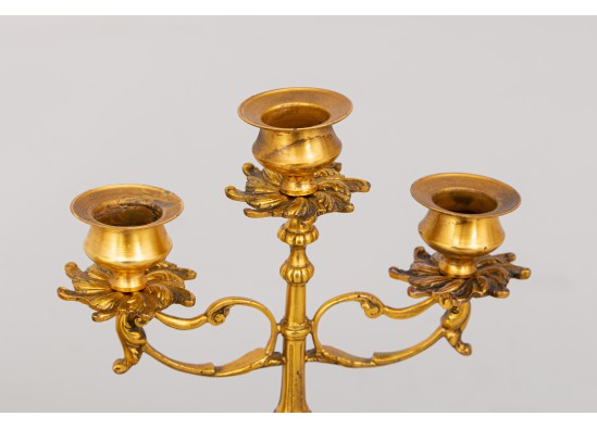 Clock with candlesticks