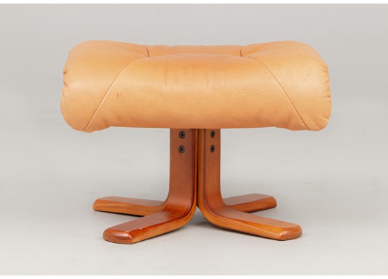 Armchair with pouf