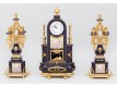 Clock and two candlesticks