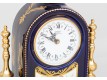 Clock and two candlesticks