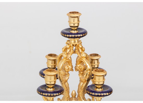 Clock and two candlesticks