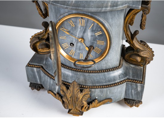 Clock and two candleholders